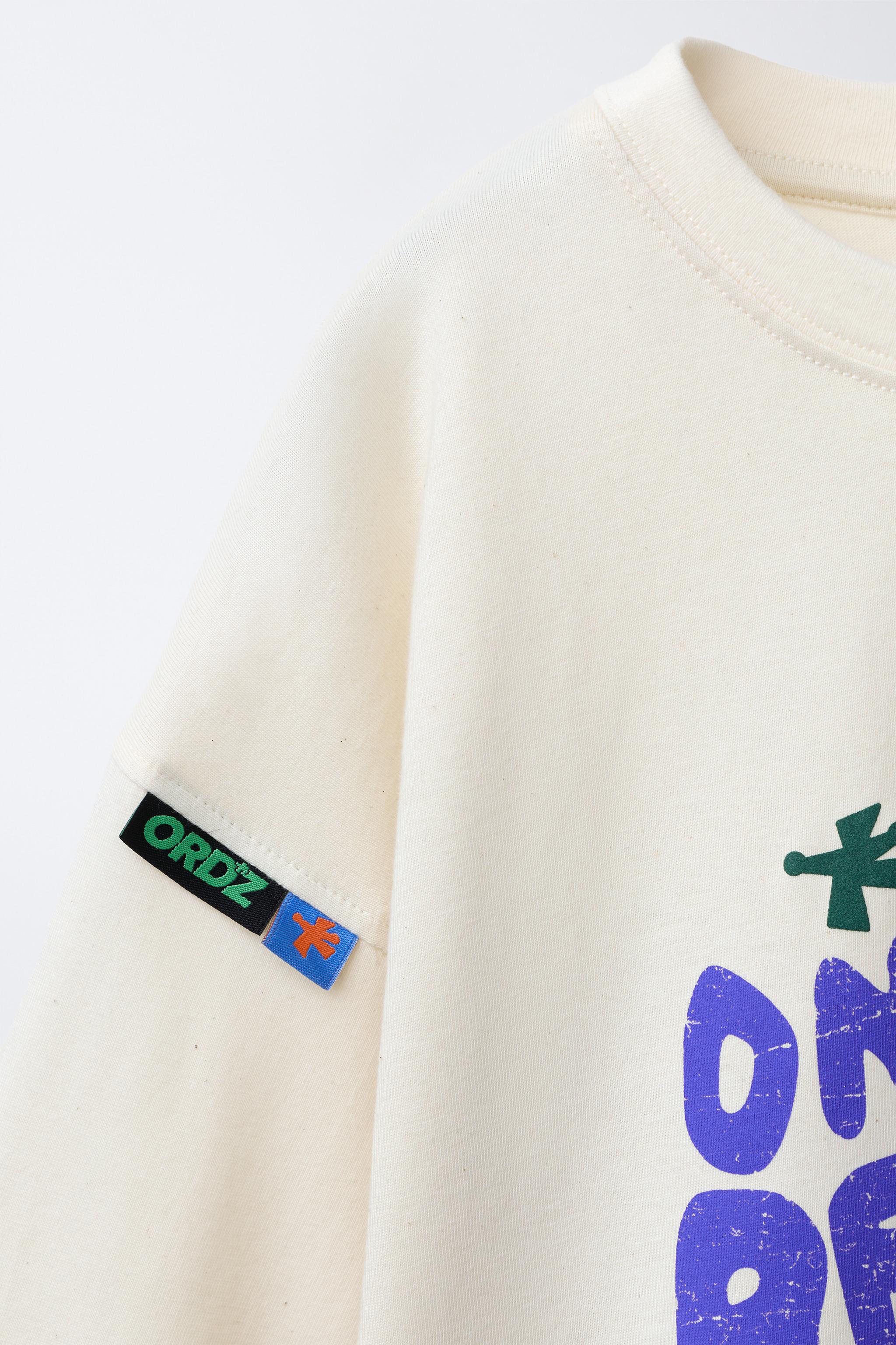 PRINTED LABEL T-SHIRT